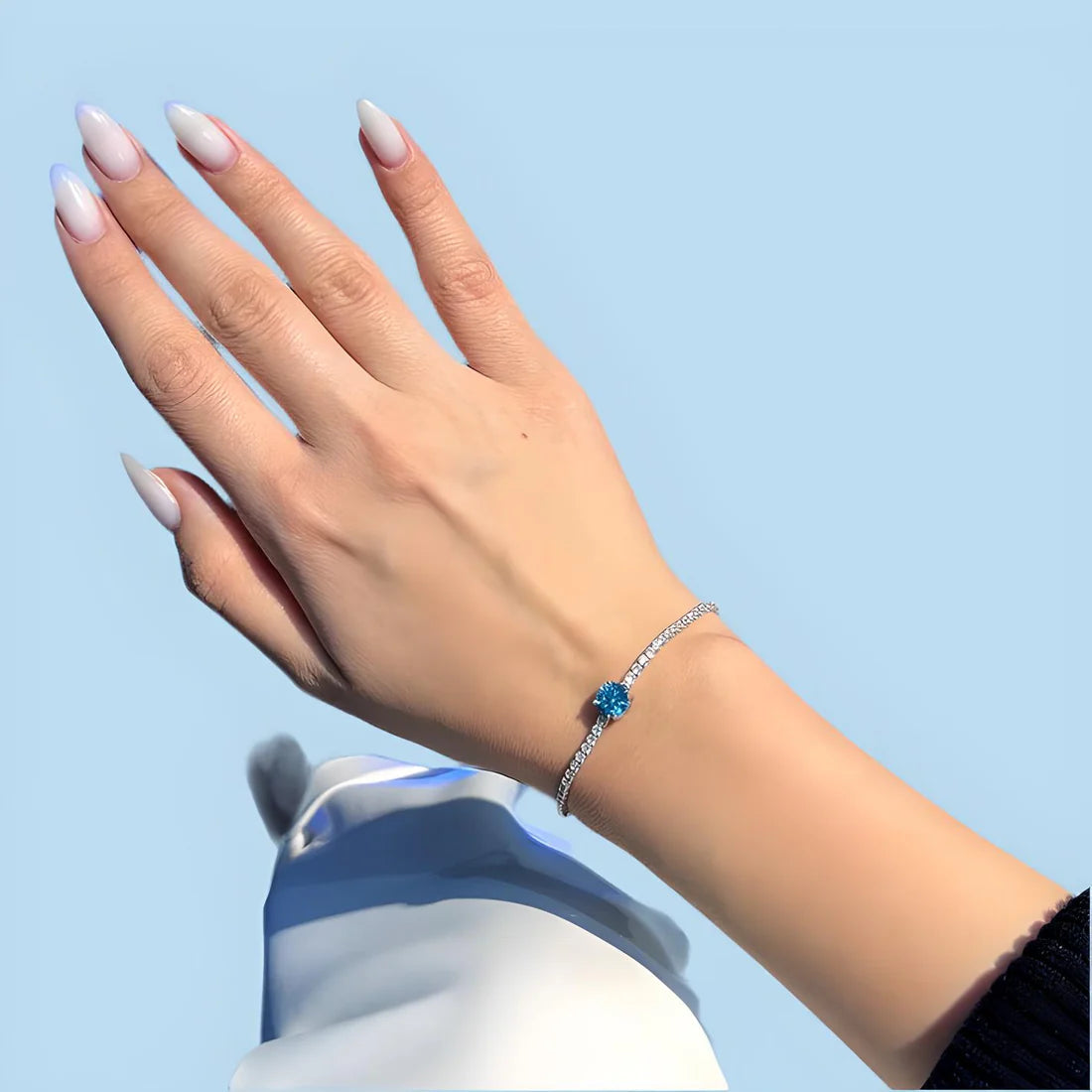 Elegant Silver Tennis Bracelet with Blue Crystal Centerpiece